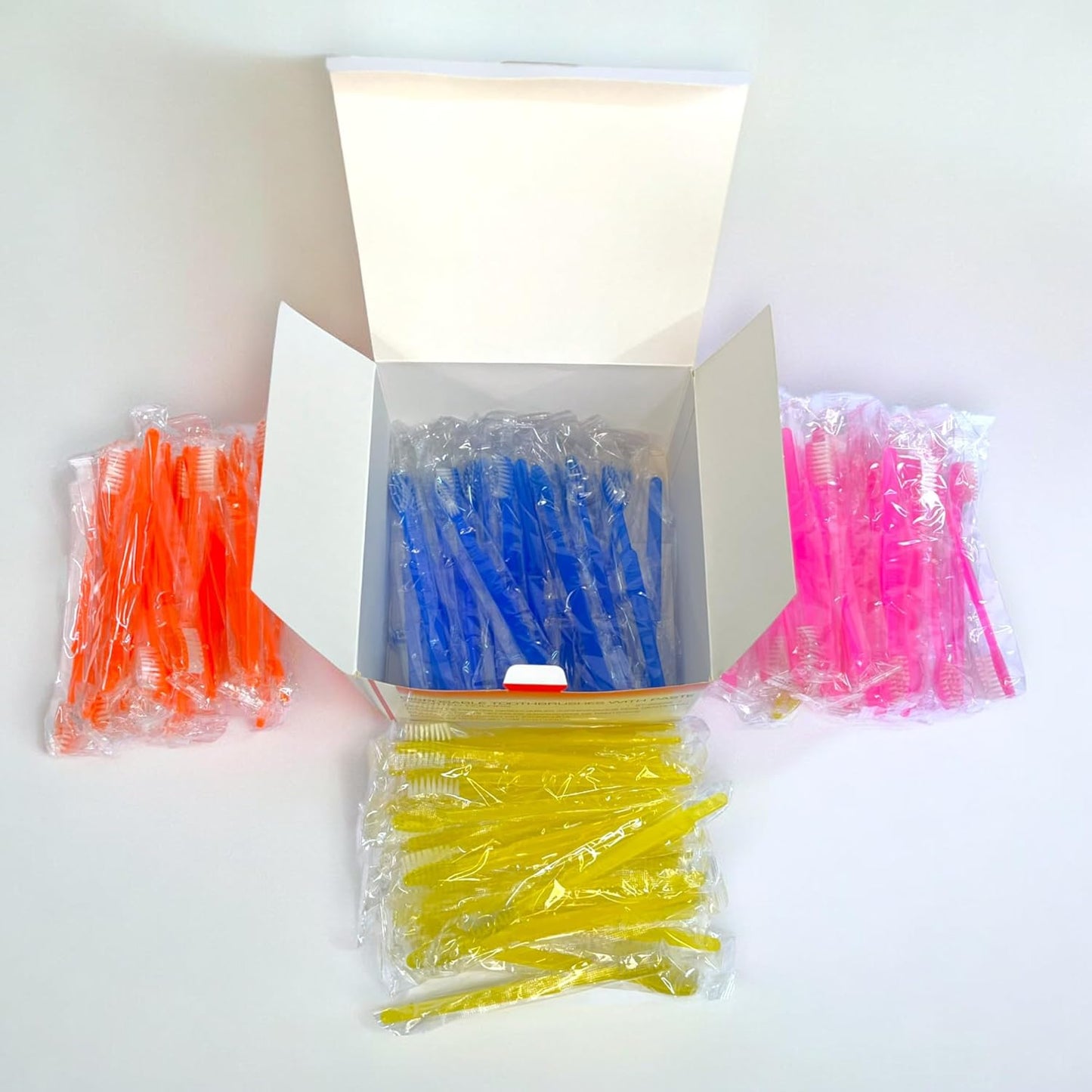 DE Healthcare Products – Einmalzahnbürsten Mit Zahnpasta (100 Stück), Einzeln Hygienisch Verpackt, 4 Untersch. Farben (4X 25 Stück)